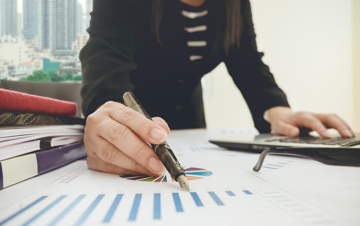 Asian Business woman discussion and analysis data the charts and graphs showing the results at meeting Business finances and accounting conceptQuick Reliable Printing (QRP)