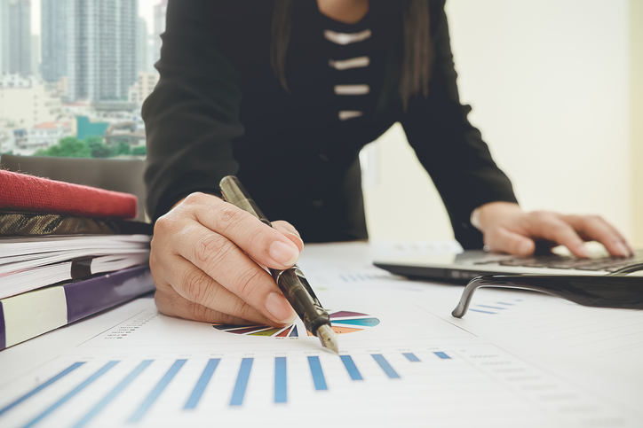 Asian Business woman discussion and analysis data the charts and graphs showing the results at meeting Business finances and accounting conceptQuick Reliable Printing (QRP)