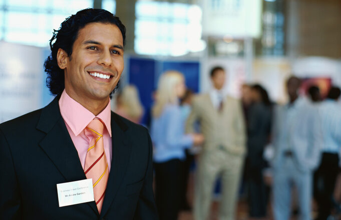 close up of a businessman at an exhibition | Quick Reliable Printing (QRP) close up of a businessman at an exhibitionQuick Reliable Printing (QRP)