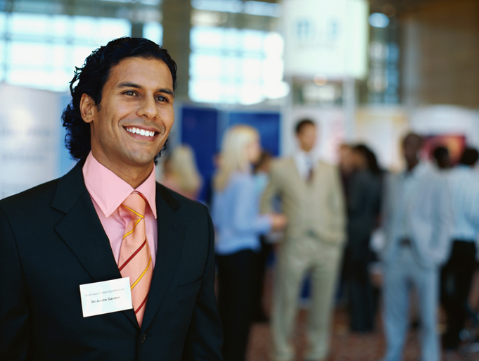 close up of a businessman at an exhibitionQuick Reliable Printing (QRP)