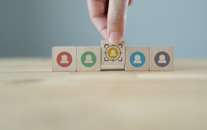 Target customer buyer persona marketing segmentation job recruitment concept Personalization marketing customer centric strategies Putting wooden cubes with focused on target customer symbolsQuick Reliable Printing (QRP)