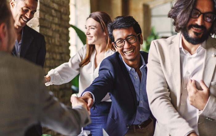 Multicultural Business Professionals Celebrating SuccessQuick Reliable Printing (QRP)