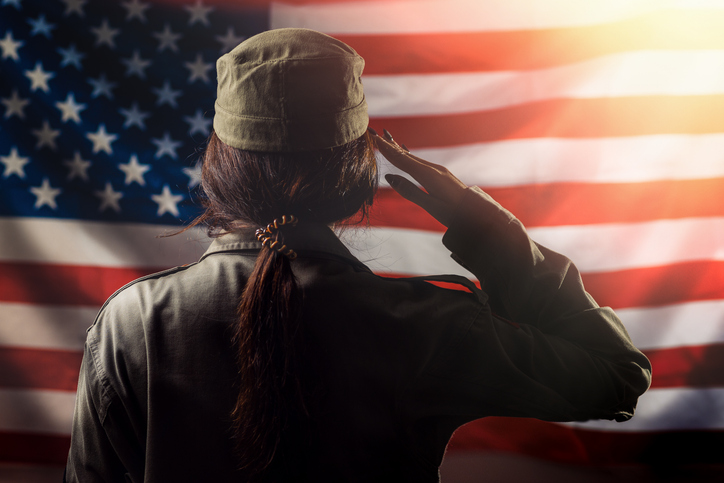 Veterans Day Memorial Day Independence Day A female soldier saluting against the background of the American flag Back view Light Concept of national American holidays and patriotism | Quick Reliable Printing (QRP) Veterans Day Memorial Day Independence Day A female soldier saluting against the background of the American flag Back view Light Concept of national American holidays and patriotismQuick Reliable Printing (QRP)