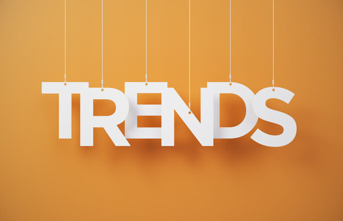 TRENDS cut on white note paper hanging on string White note paper on a Orange background | Quick Reliable Printing (QRP) Quick Reliable Printing (QRP)