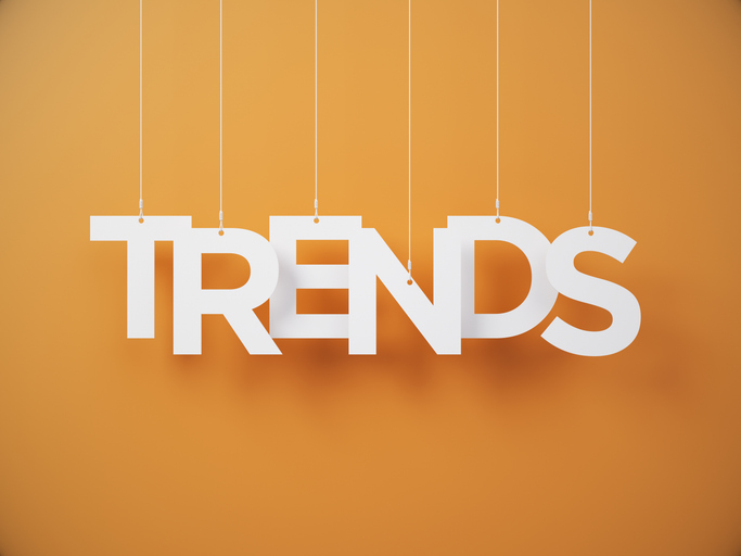 TRENDS cut on white note paper hanging on string White note paper on a Orange background | Quick Reliable Printing (QRP) Quick Reliable Printing (QRP)